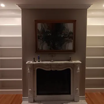 Custom shelving and fireplace mantel built in Suttons Bay, Michigan