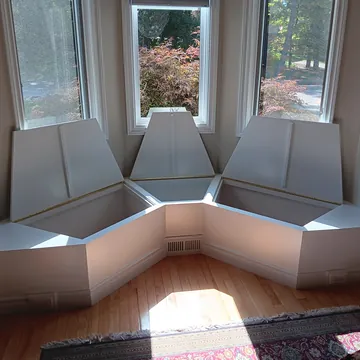 Custom built-in storage bench designed for a home remodel in Lake Leelanau, Michigan