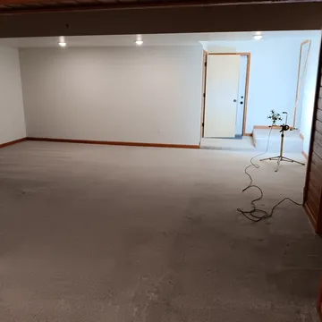 Early construction phase of a living room remodel in Lake Leelanau, Michigan